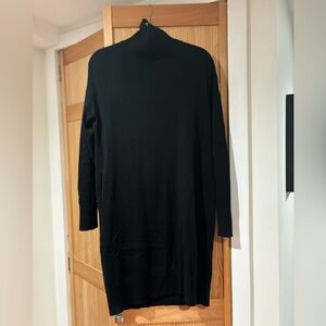 Lululemon size medium black sweater dress with pockets.